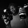 Michias Tegegne holding a camera